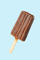 Chocolate popsicle on the sticks, frozen juice.