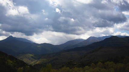 Dark cloudscape on a mountain landscape silhouette