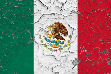 Flag of Mexico painted on cracked dirty wall. National pattern on vintage style surface.