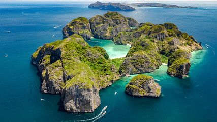 Aerial drone view of tropical Ko Phi Phi island, beaches and boats in blue clear Andaman sea water...
