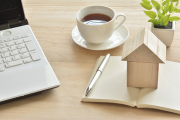 　Wooden house on a book