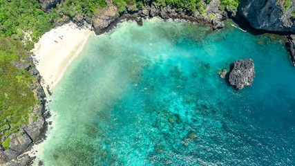 Aerial drone view of tropical Ko Phi Phi island, beaches and boats in blue clear Andaman sea water from above, beautiful archipelago islands of Krabi, Thailand