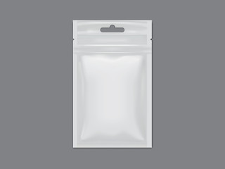 white packaging sachet on dark background