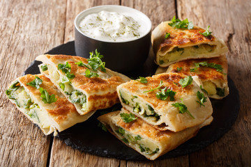 Rustic style afghan fried flatbread bolani stuffed with potatoes, green onions and cilantro...