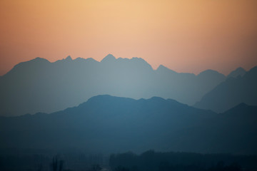 The misty peaks were at sunset