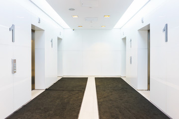 Hall with elevators in a modern office and residential building. Comfort and convenience technology. 