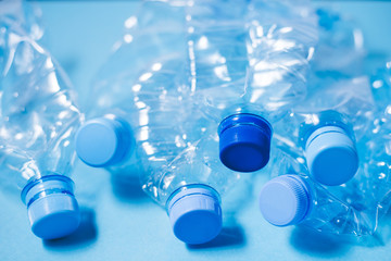 Crumpled plastic bottles of mineral water. Plastic waste background