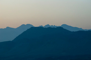 The misty peaks were at sunset