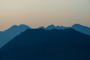 The misty peaks were at sunset