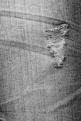 Fototapeta na wymiar Jeans torn denim texture.