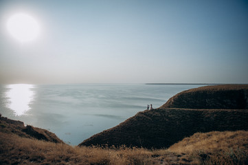 couple on the mountain beach