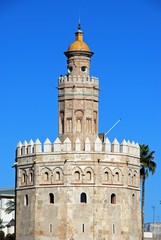 Fototapeta na wymiar Top part of the golden tower (Torre del Oro), Seville, Spain.