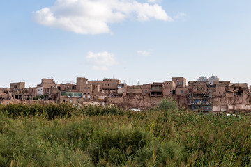 Fototapeta na wymiar Aug 2017, Kashgar, Xinjiang, China: poor districts on the outskirts of Kashgar Old Town, a major tourist spot along the Silk Road and one of the westernmost cities of China