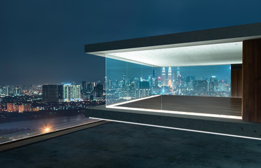 Empty glass wall balcony with city skyline view . Night scene .Mixed media .