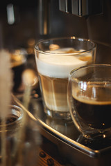 Cappuccino coffee making process in a coffee machine