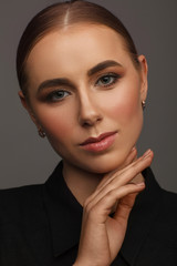 Portrait of a beautiful blonde woman. Studio photo session