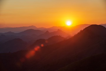 sunset in mountains and flair in laos