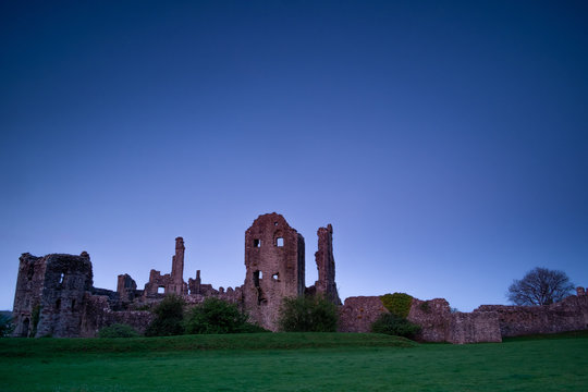 Sunrise over Coity castle, Wales