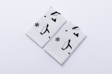 Handkerchief depicting an animal's pattern tiled on a white background