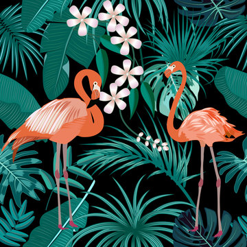 Tropical plant seamless pattern, pink flamingo and tropical leaves of palm tree.