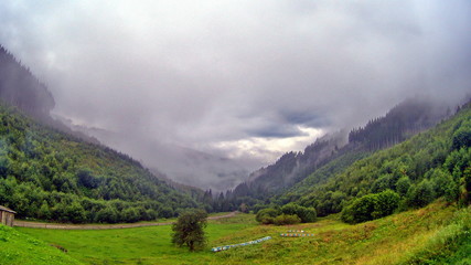 Clouds and fog over Carpathian mountains