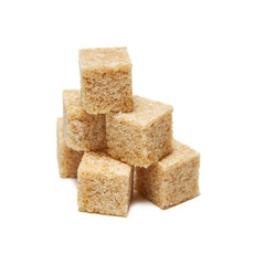 Brown cane sugar cubes isolated on white
