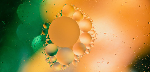 oil with bubbles on a colorful background. Abstract background. Soft selective focus