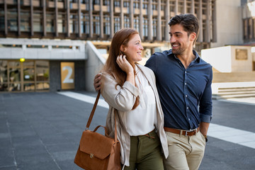 Mature couple in love walking at city centre