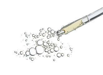 Serum oil in pipette isolated on white background. Cosmetic liquid dropper pipet with bubbles top...