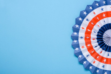 USA flag theme colored paper star fan on blue background.  4th of July Independence Day template.