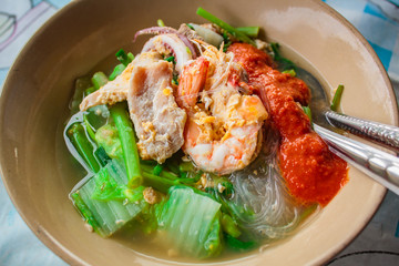 Suki in broth Mixed seafood with vermicelli and vegetables.