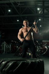 Fototapeta na wymiar Shirtless athlete view in sports gym
