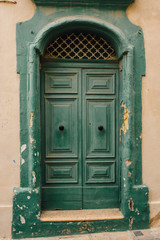Fototapeta na wymiar Maltese old green door, Malta