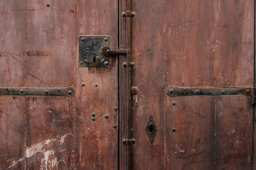 Old door with brown paint, use as natural background