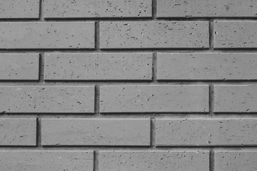 Obraz premium Abstract Black and White image of Close up brick wall that exterior design of clay house. (Selective focus)