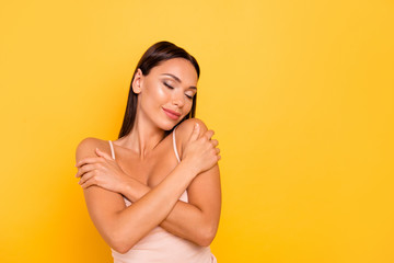 Close up photo beautiful she her lady big lips eyes closed overjoyed skin condition spa salon procedure treatment therapy wear casual pastel tank-top outfit clothes isolated yellow bright background