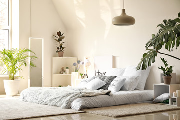 Interior of light modern bedroom