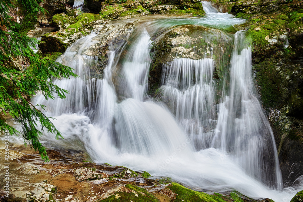 Wall mural Waterfall in the mountains