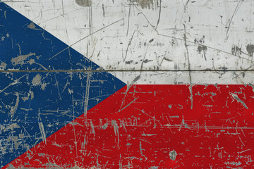 Grunge Czech Republic flag on old scratched wooden surface. National vintage background.