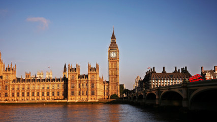 Fototapeta na wymiar Palace of Westminster and Westminster Bridge over blue sky
