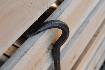 nail puller hanging on the wall