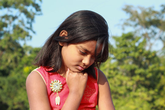 portrait of asad mood little girl