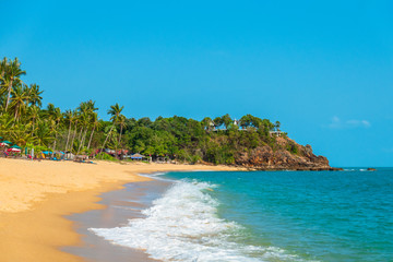 Dream scene. Beautiful yellow sand beach, the tropical sea . Summer view of nature.