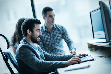 Picture of business people working together in office