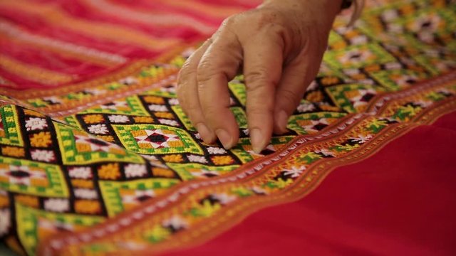 Traditional red weaving with hand, Handmade thai silk.