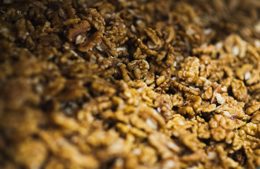 Walnut without shell on the counter of the grocery market. Harvest nutritious nuts in the store.