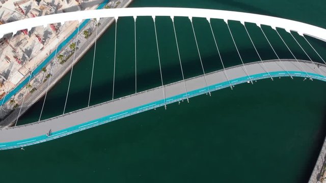 Dubai water canal tolerance bridge over the creek aerial view