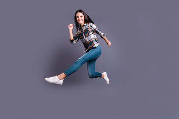 Fototapeta na wymiar Full length side profile body size photo beautiful she her lady hold hands arms flight rush free low prices shopping mall store wear casual jeans denim checkered plaid shirt isolated grey background