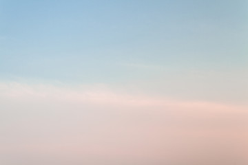 Beautiful sunset sky with feathery pink clouds in spring