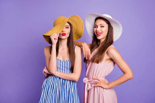 Close up photo two beautiful funny funky she her models classy ladies hide eye send air kiss perfect sunny weather coquettish mood wear sun hats summer dresses isolated purple violet background